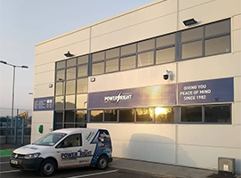 Bright sunshine reflected off Power Right Ltd. headquarters building in a beautiful morning in Sligo